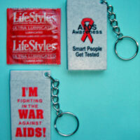 BAG OF AIDS AWARENESS CONDOM KEYCHAINS