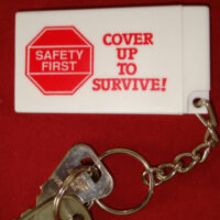 COVER UP TO SURVIVE! - Condom Key Chain
